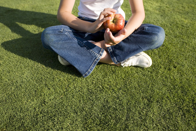 The child is eating the land