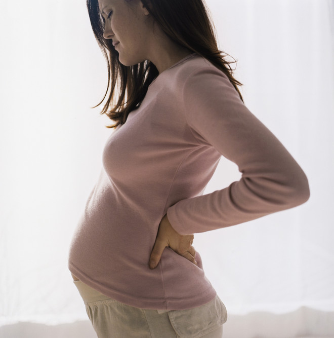 Чому при вагітності болять ребра?