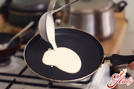 frying pancakes in a frying pan