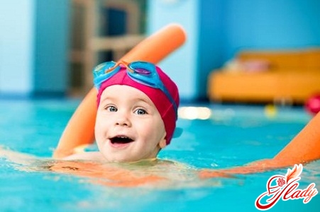 swimming instruction for children in the pool