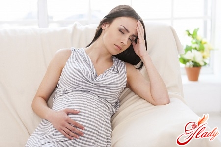 причини головних болів під час вагітності