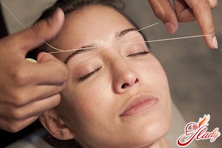 how to pluck eyebrows with a thread